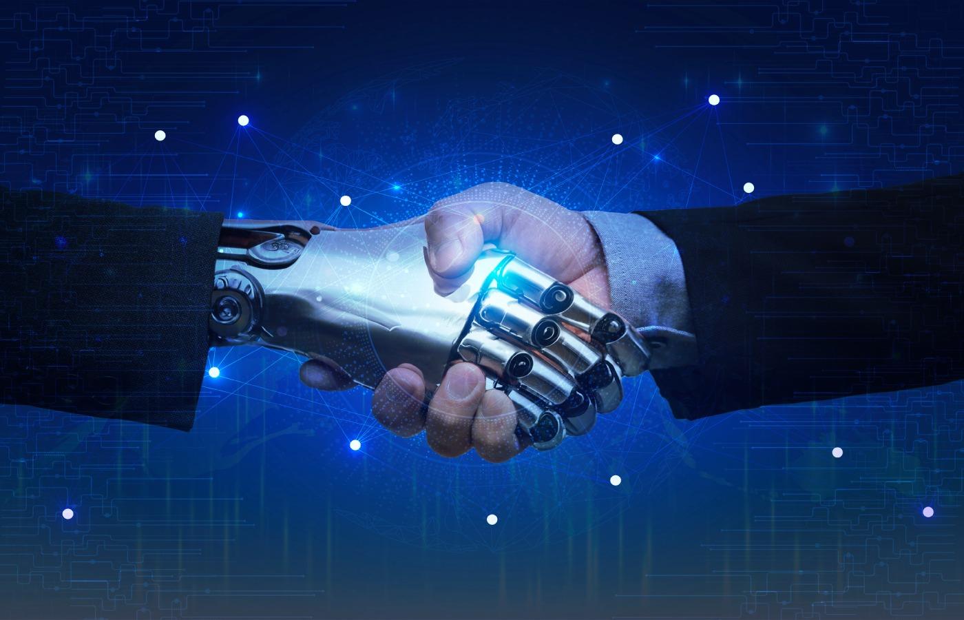 Businessman shaking hands with a robot