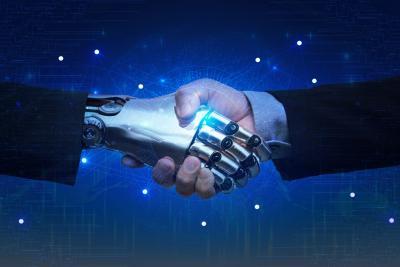 Businessman shaking hands with a robot